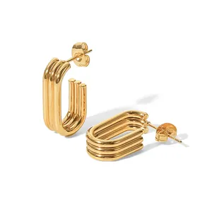 Triple-layered gold U-shaped earrings made of stainless steel for a minimalist look.
