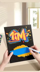 Detailed view of sky blue acrylic marker drawing graffiti on premium black cardstock