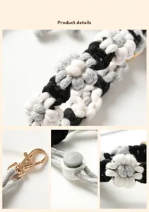 Close-up of hand-woven daisy pattern and adjustable clasp on water bottle lanyard