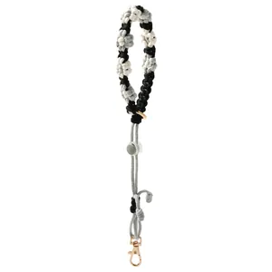 Handmade braided daisy water bottle lanyard with adjustable strap and durable metal clip