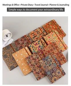 Assortment of vintage Bohemian cork notebooks with various ethnic patterns and nature motifs