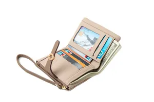 Interior detail of women's short bi-fold wallet showing multiple card slots and cash