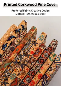 Macro view of eco-friendly cork notebook covers with vintage bohemian printed patterns