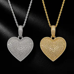 Close-up of hip-hop copper heart pendants with baguette zirconia in gold and silver