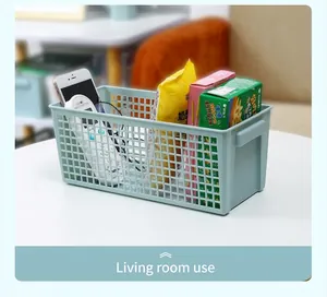 Light blue plastic mesh storage basket for living room snack organization
