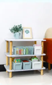 Detailed view of hollow plastic storage baskets organized on a 3-tier rack
