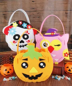 Handmade Halloween felt candy bags with pumpkin, owl, and skeleton designs
