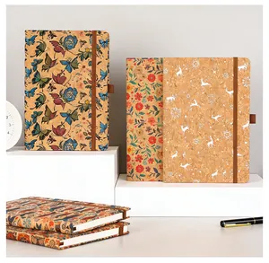 Eco-friendly cork notebooks with vintage bohemian floral and butterfly patterns