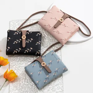 Elegant floral print women's short wallet with crossbody strap and bifold flap design