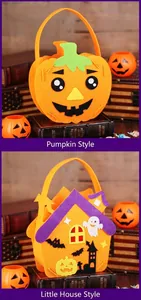 Detailed view of Halloween DIY felt candy bags in pumpkin and house shapes for children