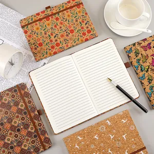 Vintage eco-friendly cork notebooks with floral and bohemian patterns for office and journaling