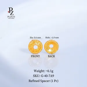 Vue macro détaillée d'une perle d'espacement dorée pour la création de bijoux DIY