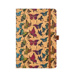 Eco-friendly cork notebook with colorful butterfly pattern and elastic band.