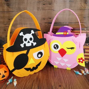 Two cute Halloween felt candy bags featuring pumpkin pirate and owl witch designs.