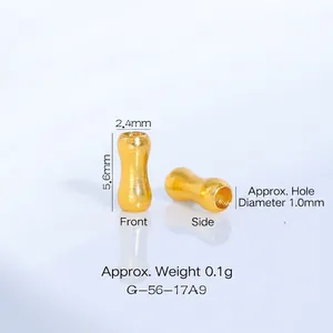 Vue macro d'une perle d'espacement dorée pour bijoux DIY avec dimensions.