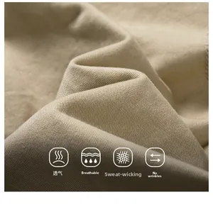 Makroansicht der khakifarbenen Baumwoll-Twill-Stofftextur für Herren-Cargo-Shorts
