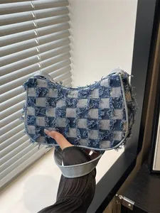 Stylish checkerboard frayed denim underarm shoulder bag with a frayed edge canvas design