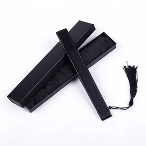 Black lacquered folding fan with silk tassel and matching black gift box display