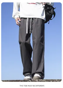 Men's dark grey cotton straight-leg casual trousers with drawstring waist detail.