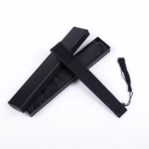 Elegant Chinese style black lacquered folding fan with a matching black gift box.
