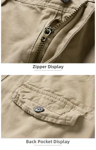 Detaillierte Makroansicht von Metallreißverschluss und Gesäßtasche an Herren-Cargo-Shorts.