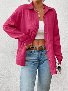 Detail view of fuchsia long-sleeved crinkled shirt with oversized drop shoulder fit