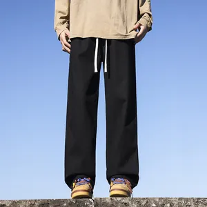 Loose-fit men's pure cotton casual pants in black featuring a straight-leg design.
