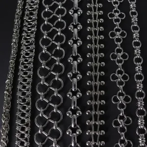 Close-up of multiple styles of silver-plated metal chains for DIY jewelry making