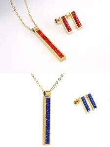 Detailed close-up view of elegant gold-plated stainless steel red and blue crystal pavé bar jewelry sets