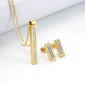 Gold plated stainless steel jewelry set with crystal bar necklace and earrings.