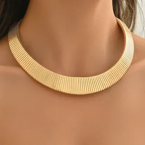Bold gold-tone ribbed choker necklace for women featuring an elegant metallic shine