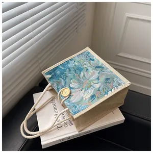 Elegant floral tapestry small tote bag for women featuring rope handles and button
