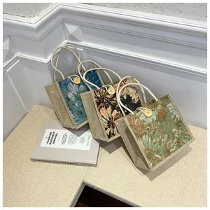 Small floral tapestry burlap tote bags with rope handles and wooden button closure