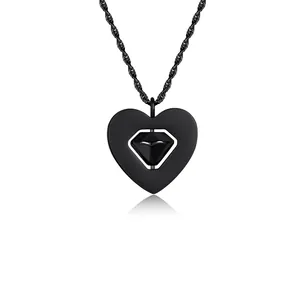 Close-up of black rotatable heart pendant necklace showing intricate diamond detail