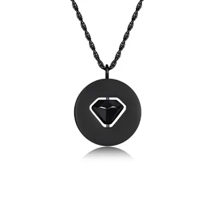 Close-up of black rotatable heart round plate necklace showing the intricate design detail.