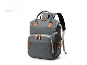 Side view of dark gray diaper backpack with large capacity and quilted front