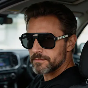 Close-up of men's retro square polarized sunglasses with decorative wing temple