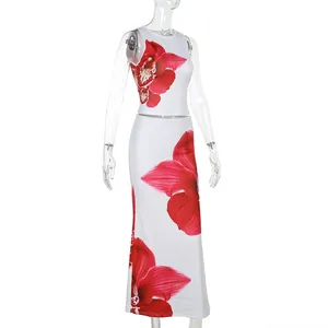 Elegant two-piece summer set with red orchid floral print sleeveless top and maxi skirt.