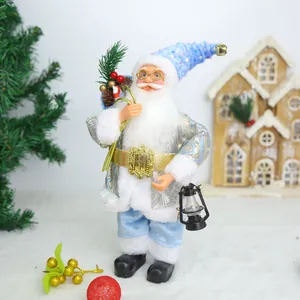 Detailed standing Santa Claus figurine in blue and silver outfit holding a lantern