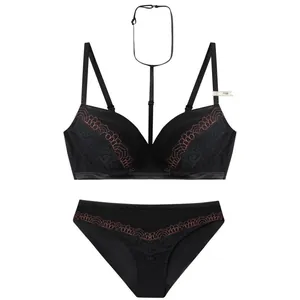 Elegant black lace lingerie set with embroidered detail and detachable choker strap.