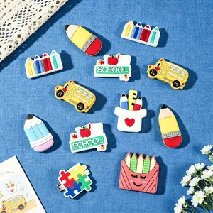 12-piece set of cute cartoon stationery hair clips with school bus and pencil designs