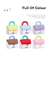 Set of soft quilted portable cosmetic bags shaped like small houses in pastel colors.
