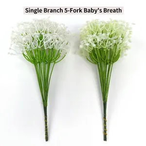 Two bunches of artificial Baby's Breath flowers in white and pale green detail