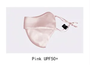 Détail d'un masque de protection solaire en soie de mûrier rose avec indice UPF50+