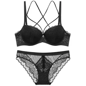Sexy black lace lingerie set featuring deep V push-up bra and sheer floral panties