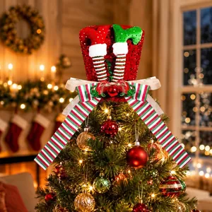 Festive red sequined Christmas tree topper hat with elf legs and striped bow decoration