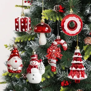 Red and white festive Christmas tree ornaments set with various holiday shapes