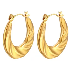 Elegant twisted irregular gold stainless steel hoop earrings for women in retro fashion