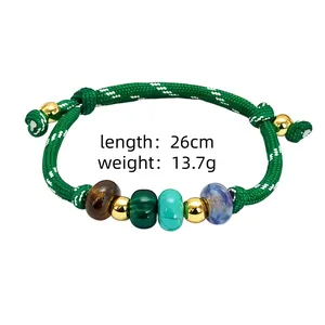 Detail view of handmade braided bracelet with natural stone beads and specs