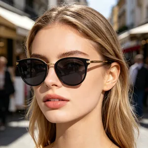 Close-up of vintage polarized sunglasses with black frames and gold metal accents